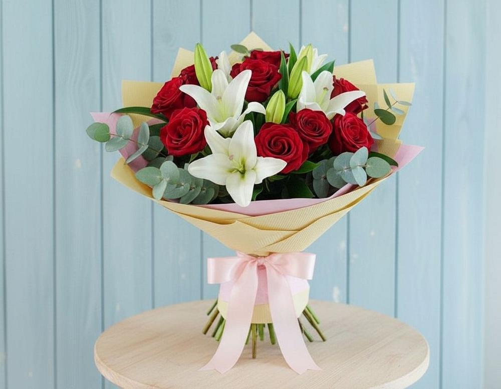 Букет цветов из: Лилии и Розы в Вулканном